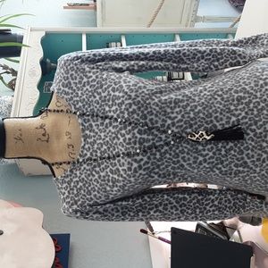 Cheekys Brand multicolored bead necklace with hair on hide pendant